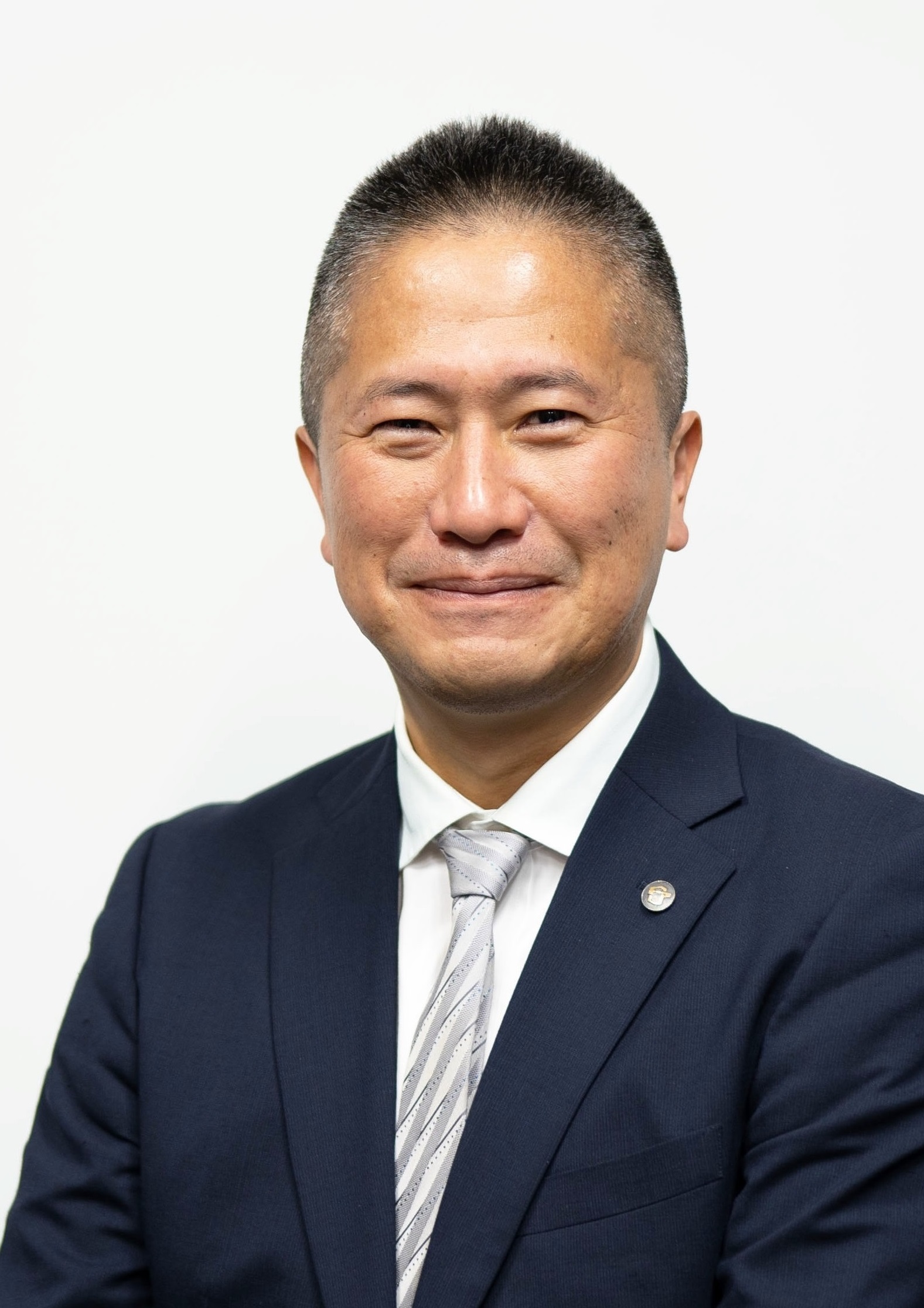 取締役 生産本部長　田中慎一